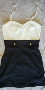 FItted black and cream colored dress size small